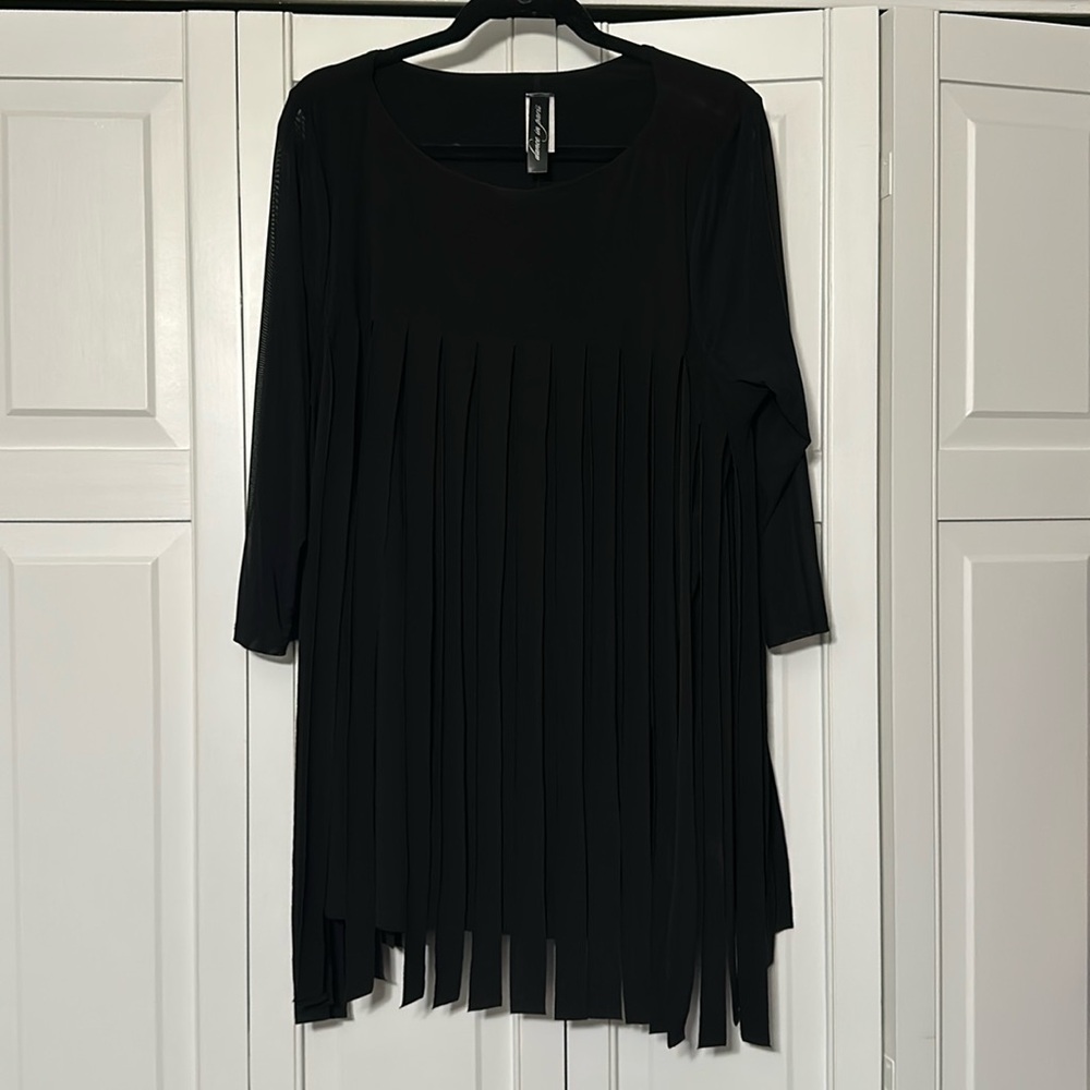 Women’s tunic top size XL excellent condition.